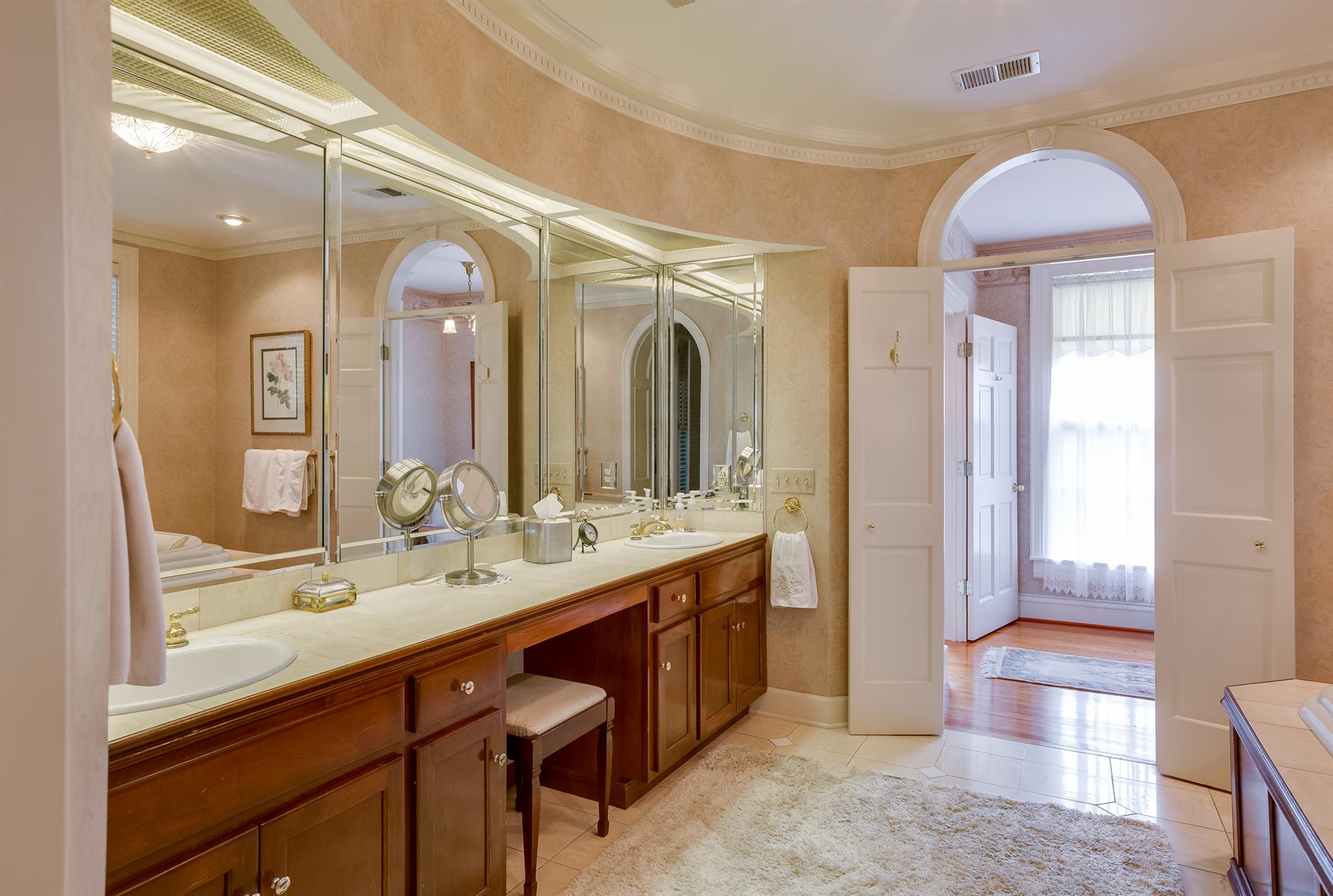 317 North Garner Street Springfield, TN 37172 - Photo 30 of 30 a bathroom with a double vanity sink and a mirror