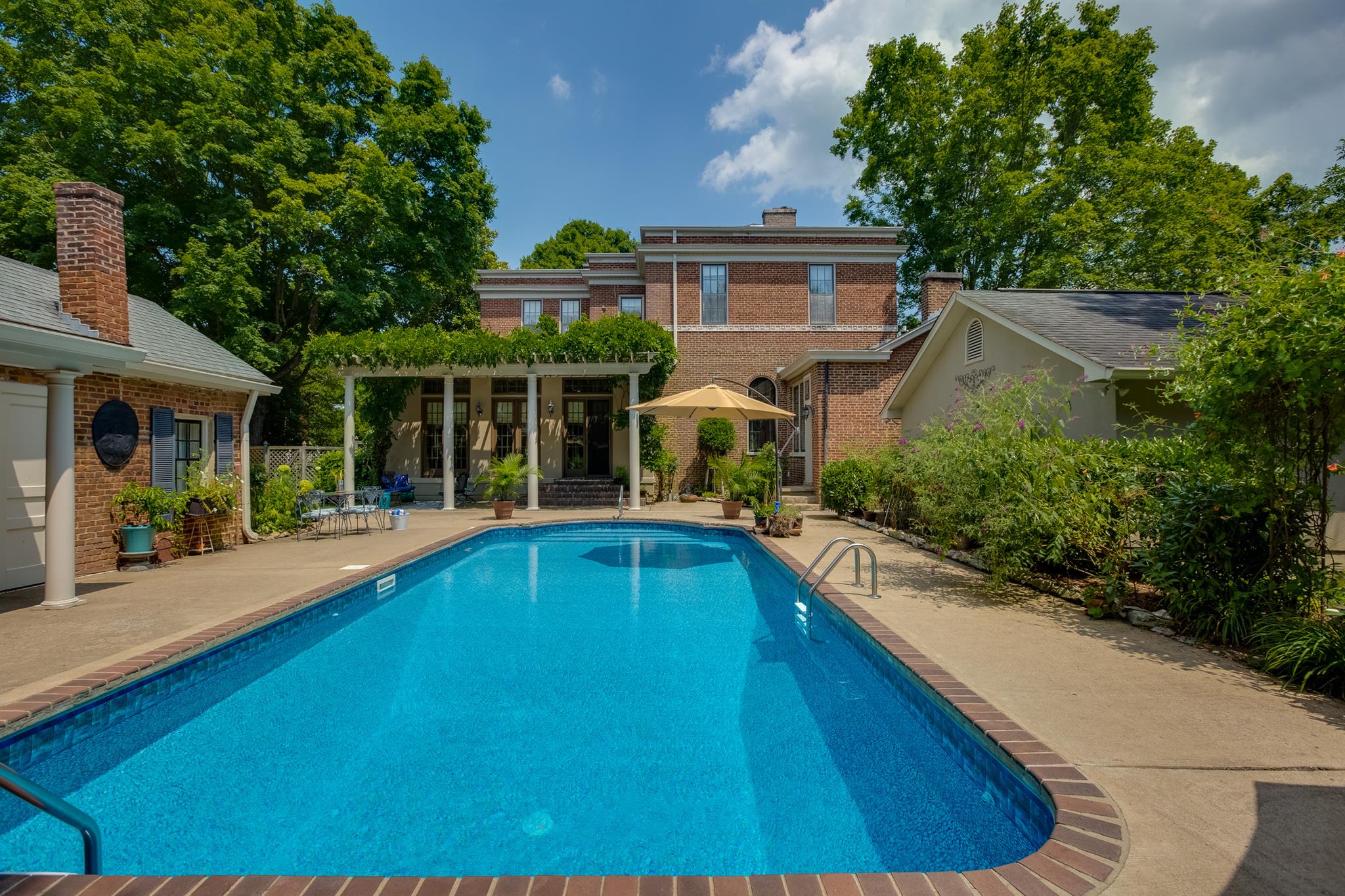 317 North Garner Street Springfield, TN 37172 - Photo 10 of 30 a view of house with outdoor space and swimming pool