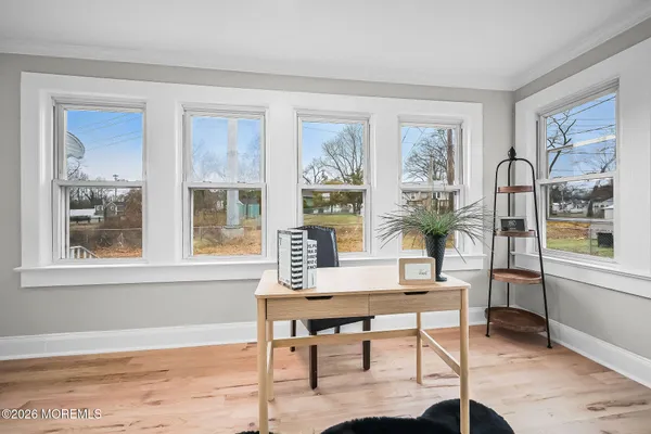 a view of a livingroom with furniture and window