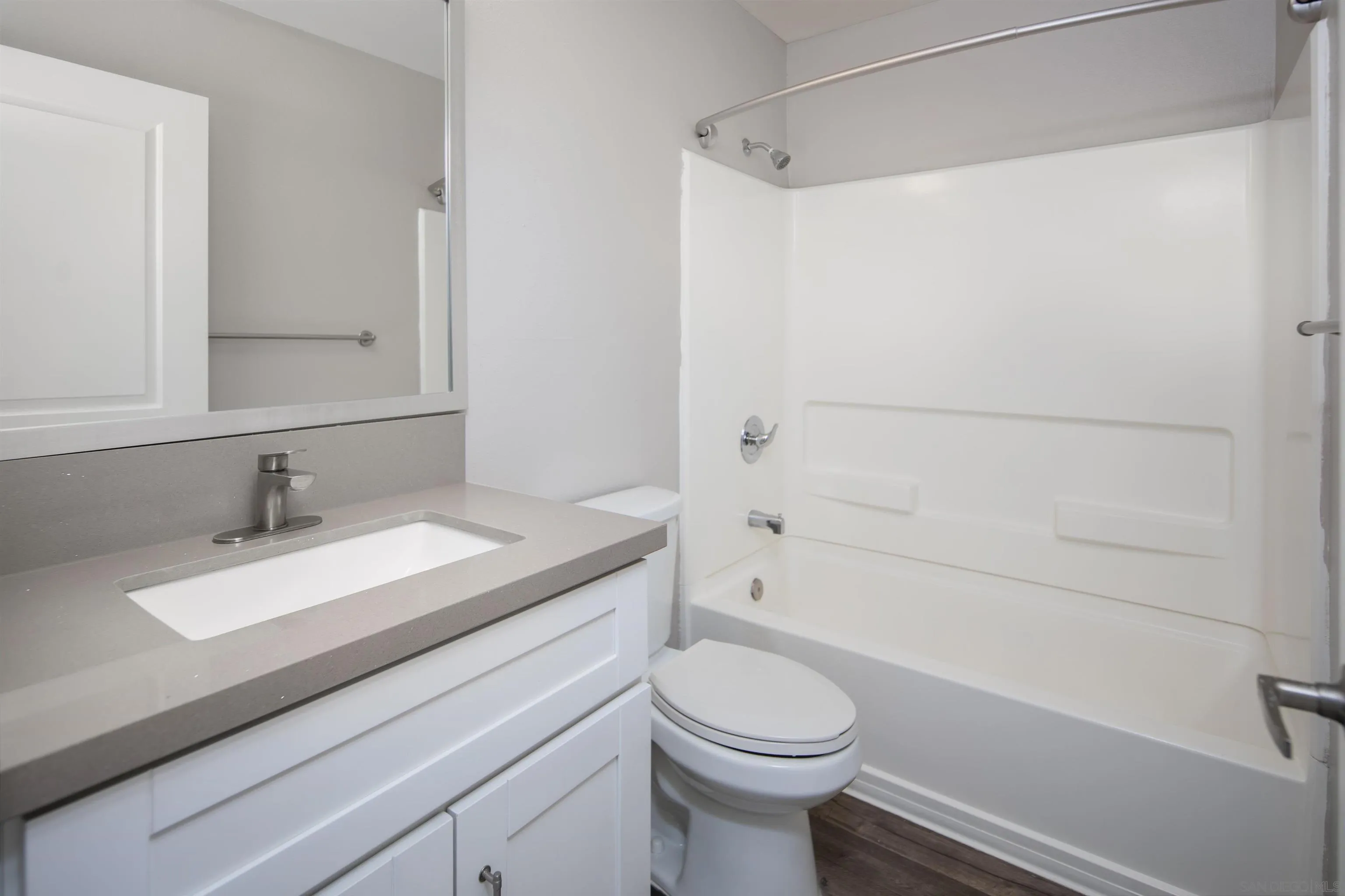 725 Alturas Lane Fallbrook, CA 92028 - Photo 24 of 34 a bathroom with a granite countertop sink toilet and shower