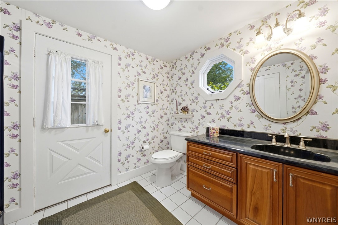 9780 New Oregon Road Eden, NY 14057 - Photo 17 of 50 Primary bed en suite bath with walk in shower and easy access from back patio