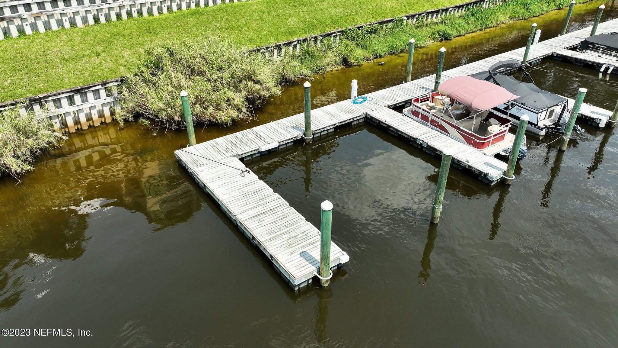 99 Broad River Place, Unit 1301 Welaka, FL 32193 - Photo 39 of 50 a view of a balcony with chairs