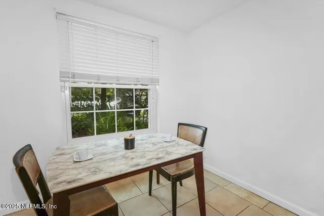 a workspace with furniture and window