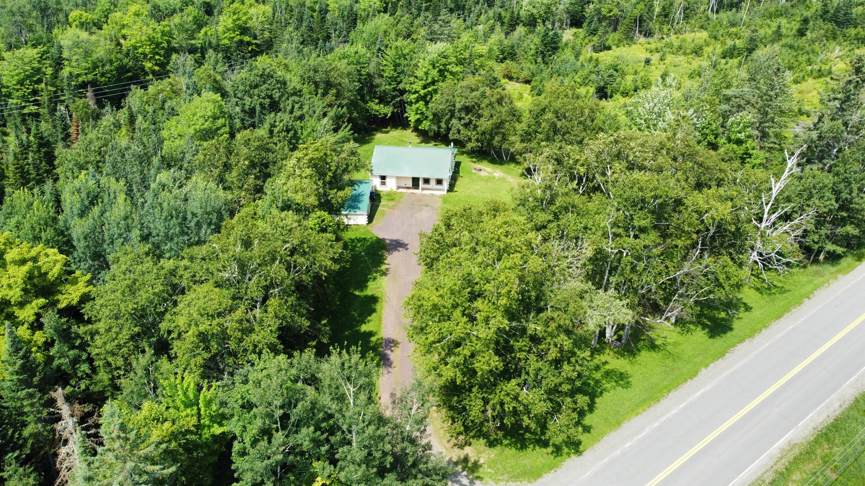 3195 State Road Mapleton, ME 04757 - Photo 4 of 42 dji_fly_20230726_131036_159_169039202599