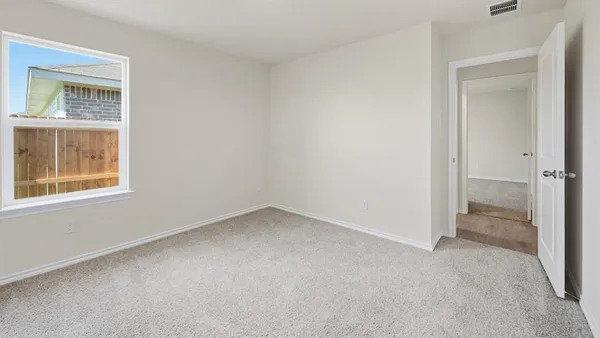 an empty room with a window