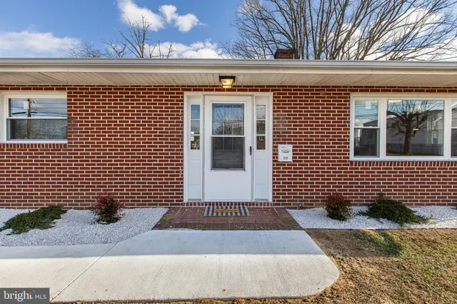 a view of a brick house with a door