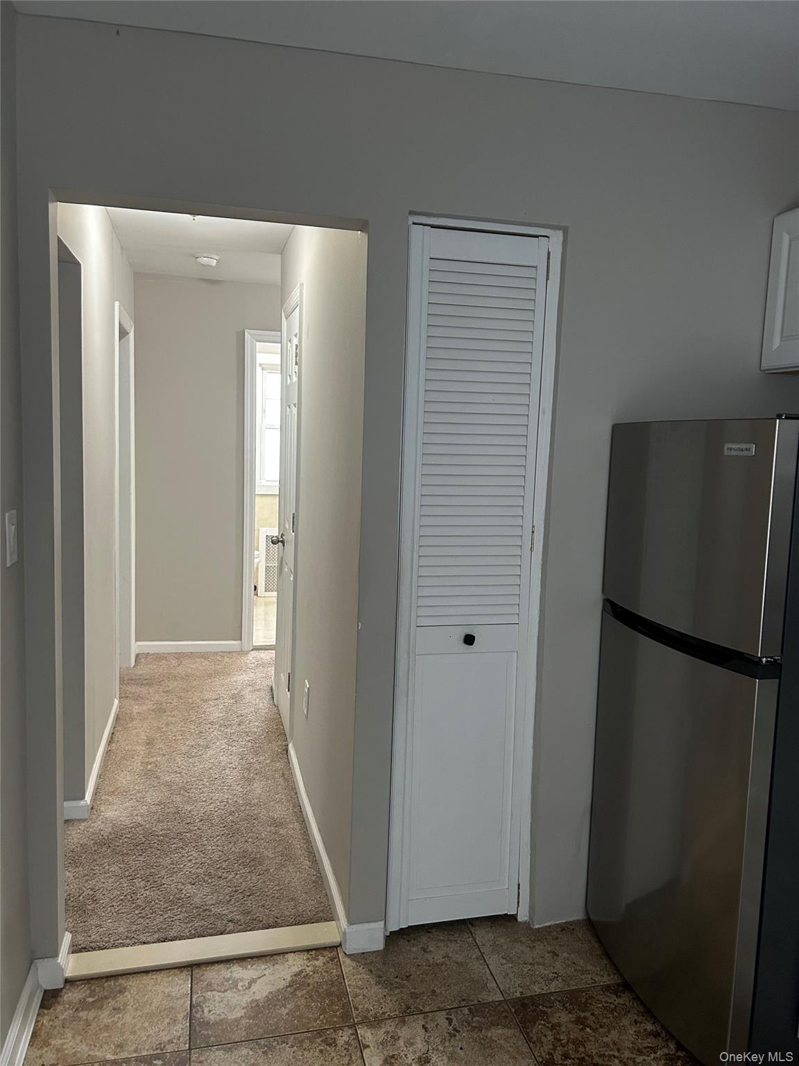 248-15 89th Avenue, Unit 2 Queens, NY 11426 - Photo 9 of 9 Hallway facing from kitchen