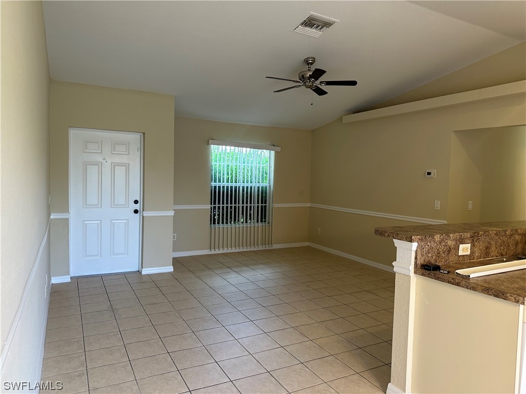 4106 24th Street Southwest Lehigh Acres, FL 33976 - Photo 2 of 15 a view of a livingroom with a furniture