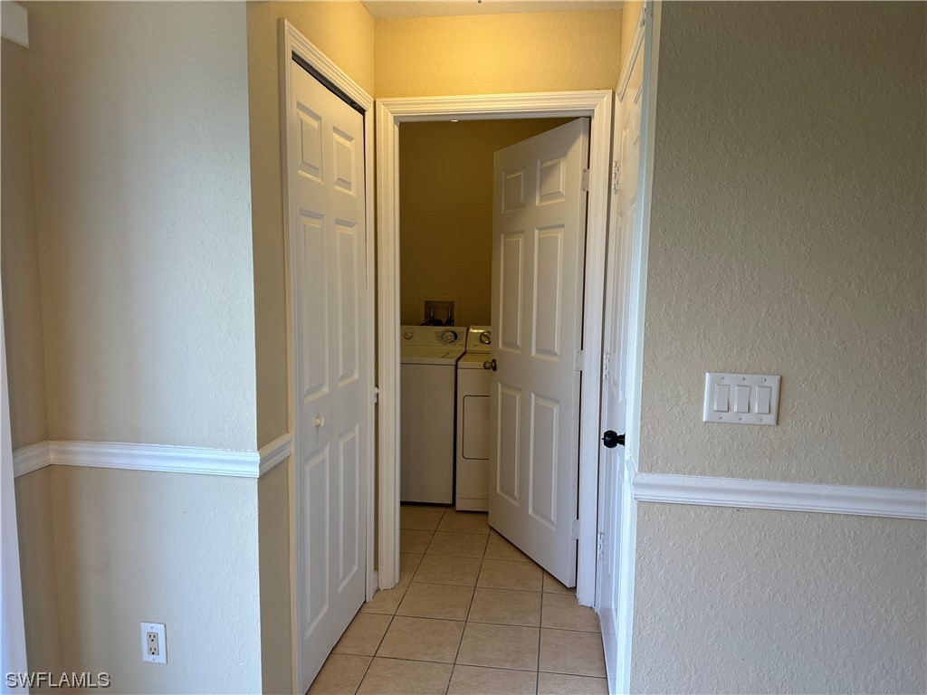 4106 24th Street Southwest Lehigh Acres, FL 33976 - Photo 5 of 15 a view of a walk in closet
