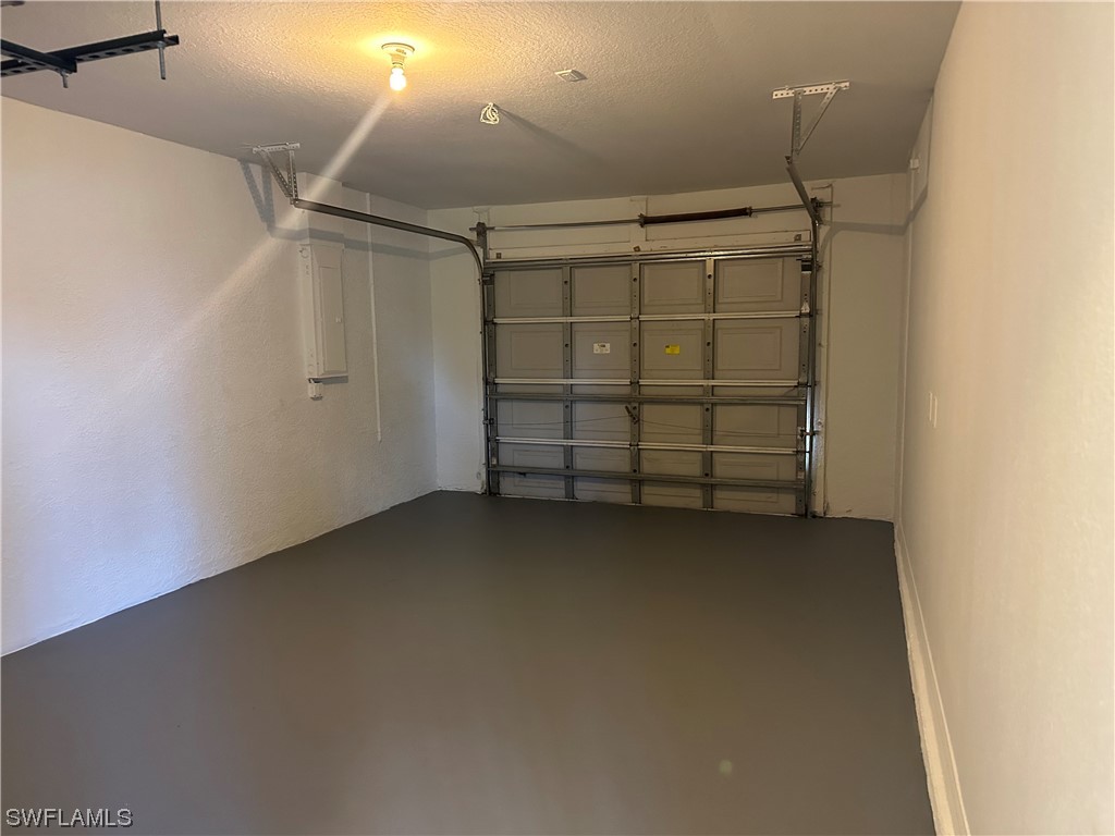 4106 24th Street Southwest Lehigh Acres, FL 33976 - Photo 6 of 15 a view of a room with an empty space