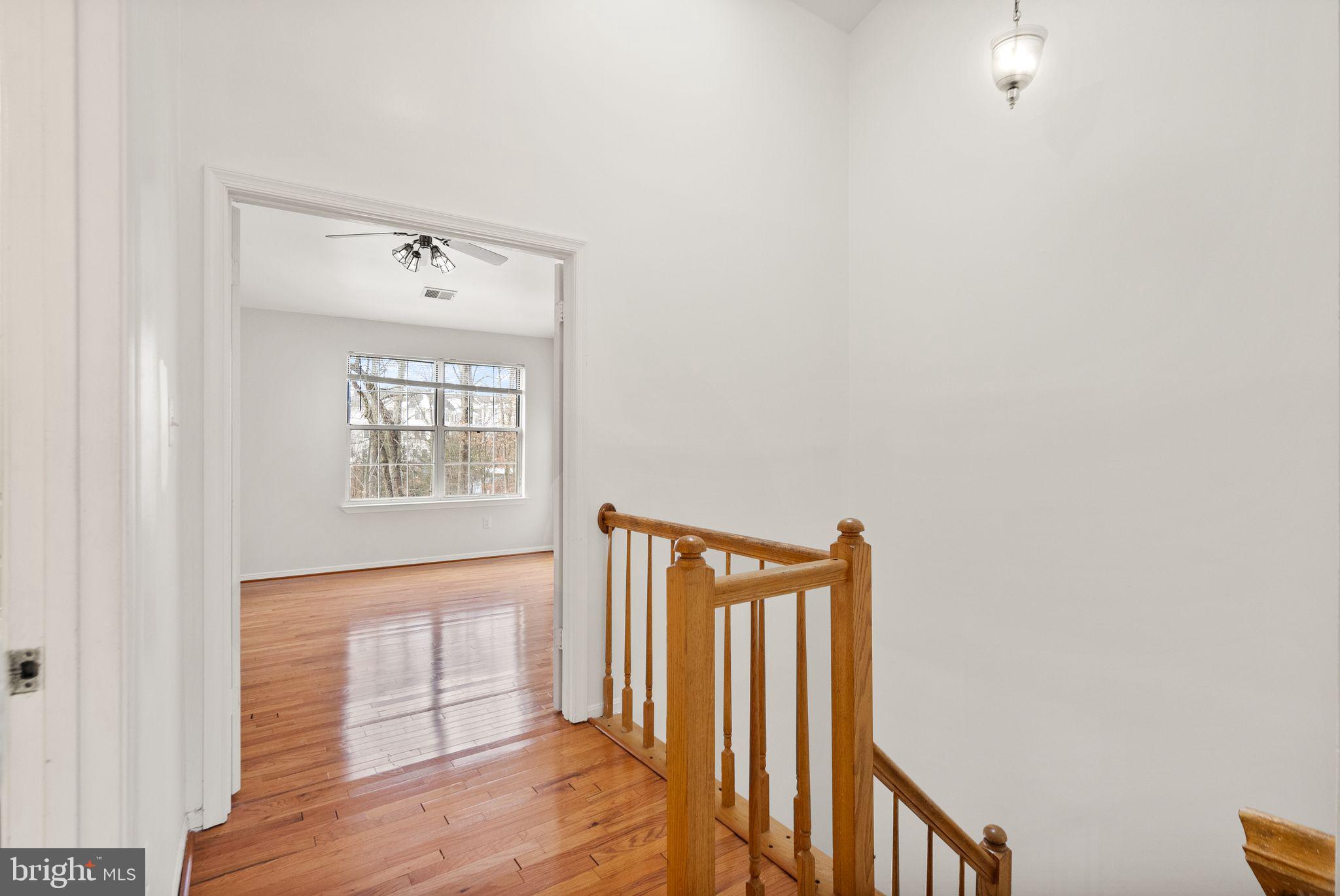 47621 Comer Square Sterling, VA 20165 - Photo 26 of 81 BEAUTIFUL WOOD FLOORS IN UPSTAIRS HALLWAY