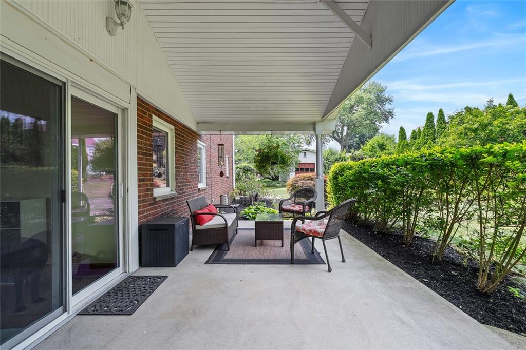 4 Cheryl Drive Coraopolis, PA 15108 - Photo 17 of 32 a view of patio with a table and chairs and potted plants