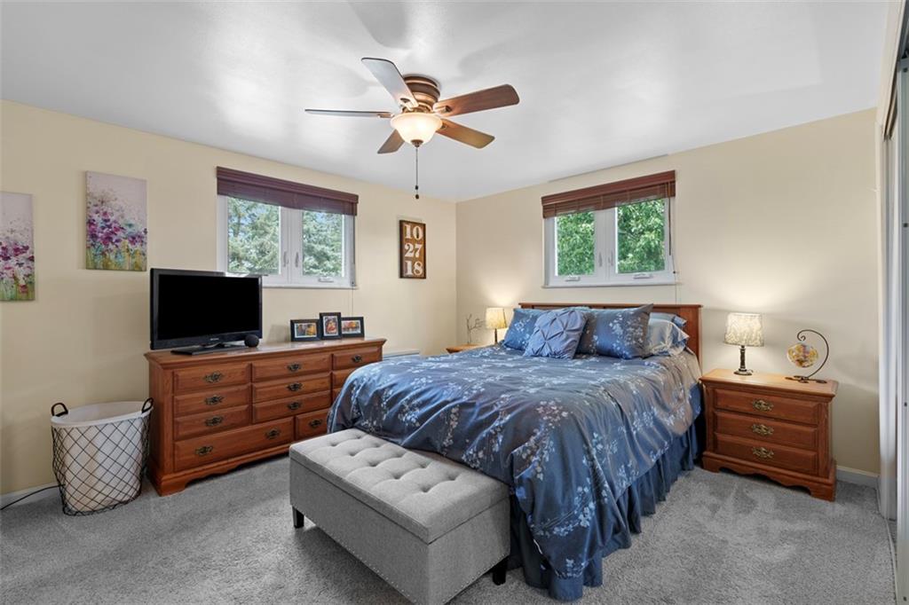 4 Cheryl Drive Coraopolis, PA 15108 - Photo 18 of 32 a bedroom with a bed and a flat screen tv