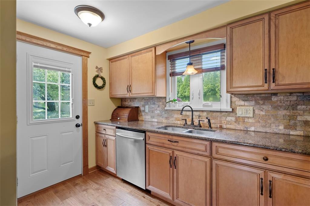 4 Cheryl Drive Coraopolis, PA 15108 - Photo 9 of 32 a kitchen with a sink cabinets and window