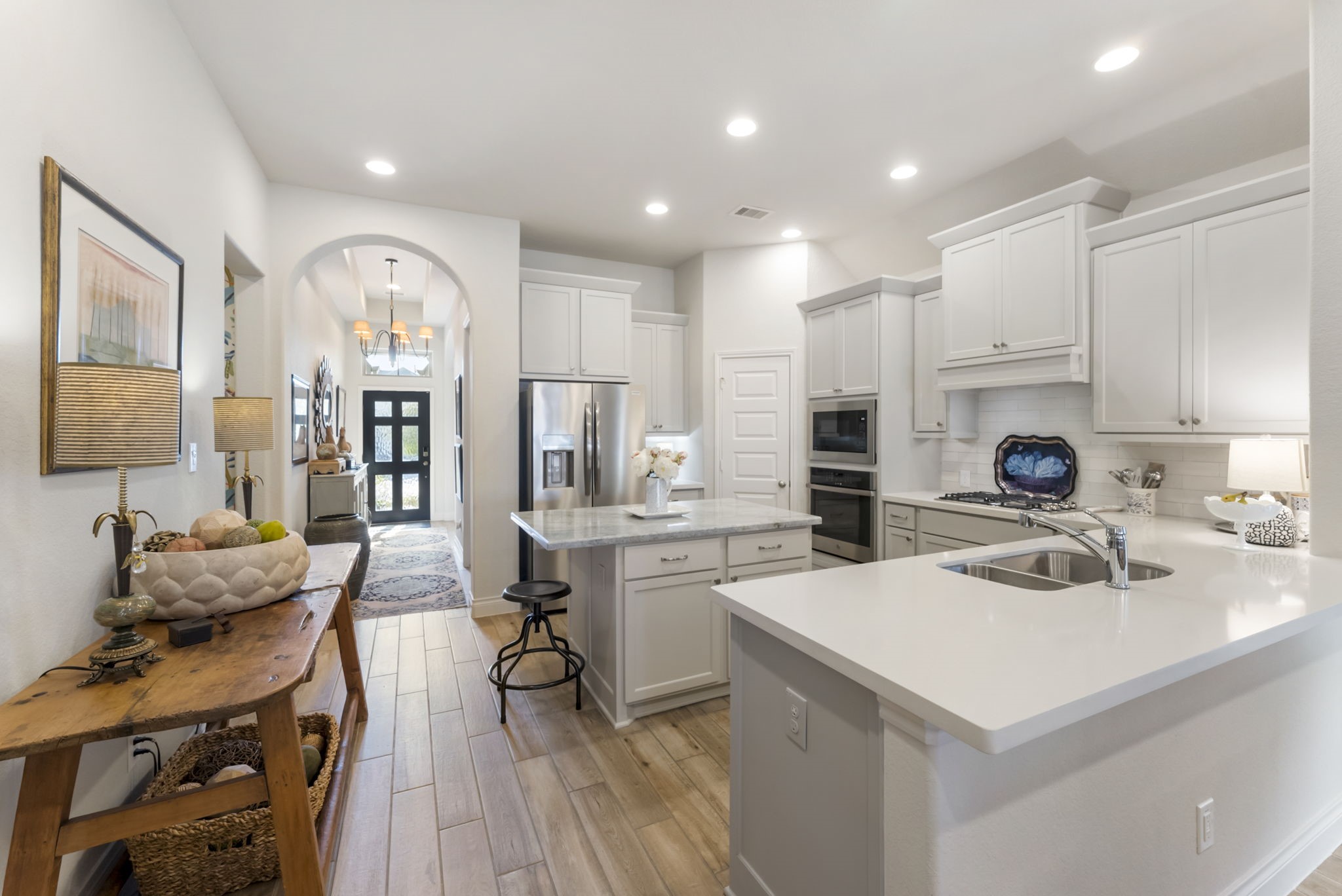 545 Cedar Harbor Court Conroe, TX 77304 - Photo 15 of 50 a kitchen with a sink appliances and cabinets