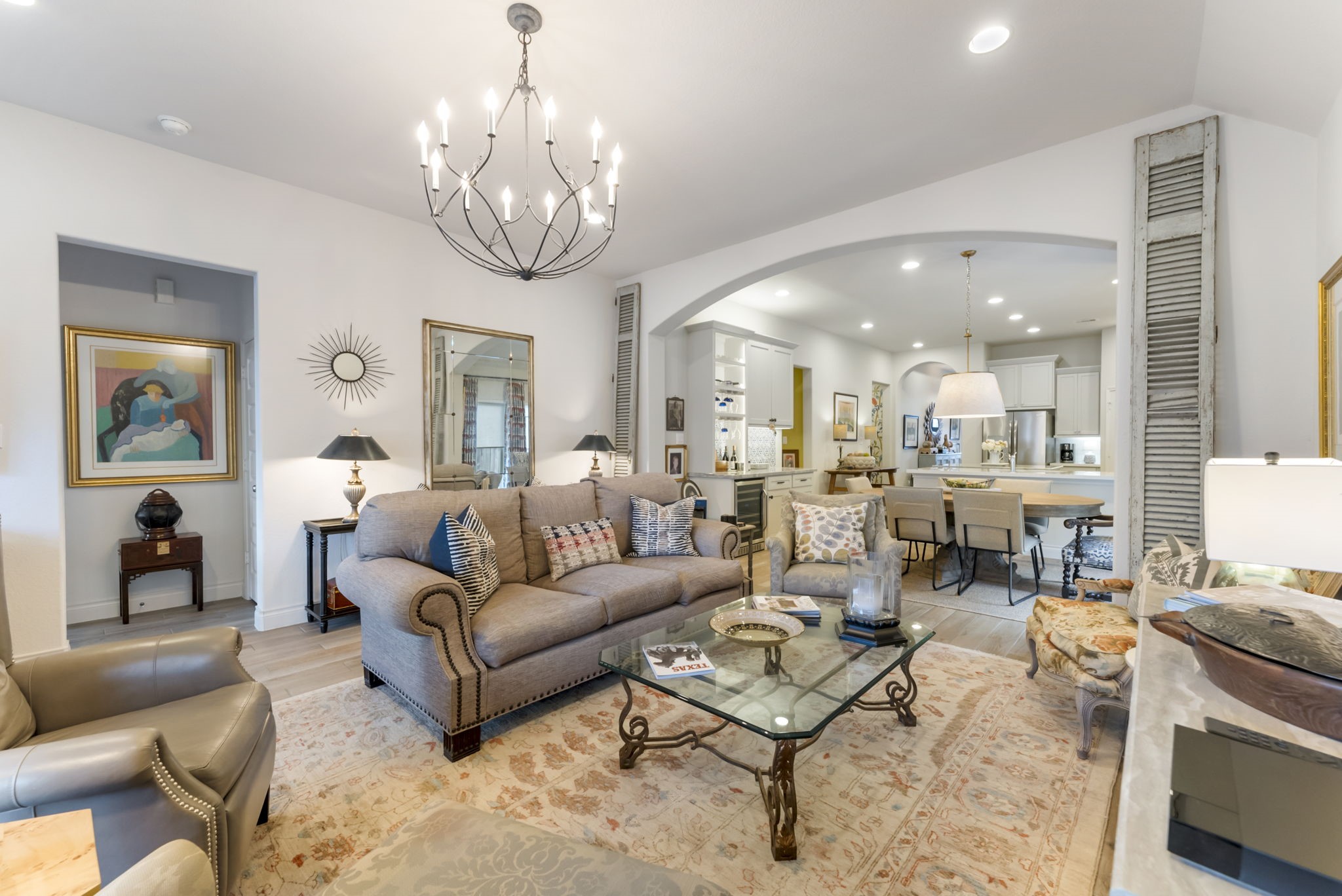 545 Cedar Harbor Court Conroe, TX 77304 - Photo 21 of 50 a living room with fireplace furniture and a chandelier