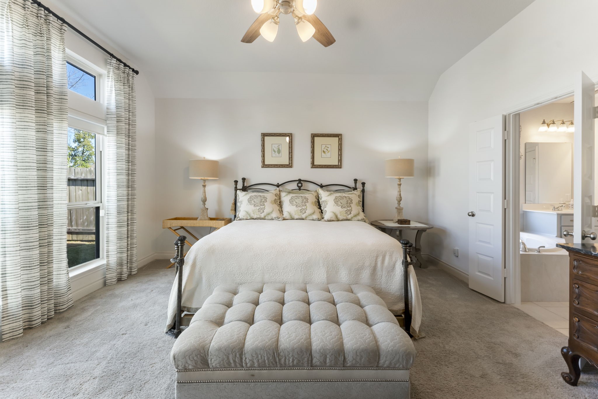 545 Cedar Harbor Court Conroe, TX 77304 - Photo 27 of 50 a bedroom with a bed and a large window