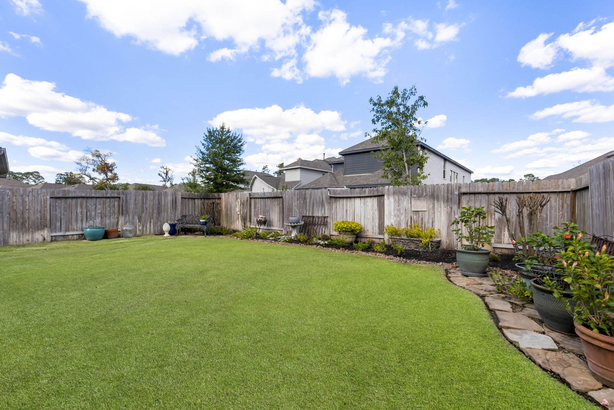 545 Cedar Harbor Court Conroe, TX 77304 - Photo 39 of 50 a front view of a house with garden