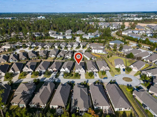 a view of a chairs and table in a yard
