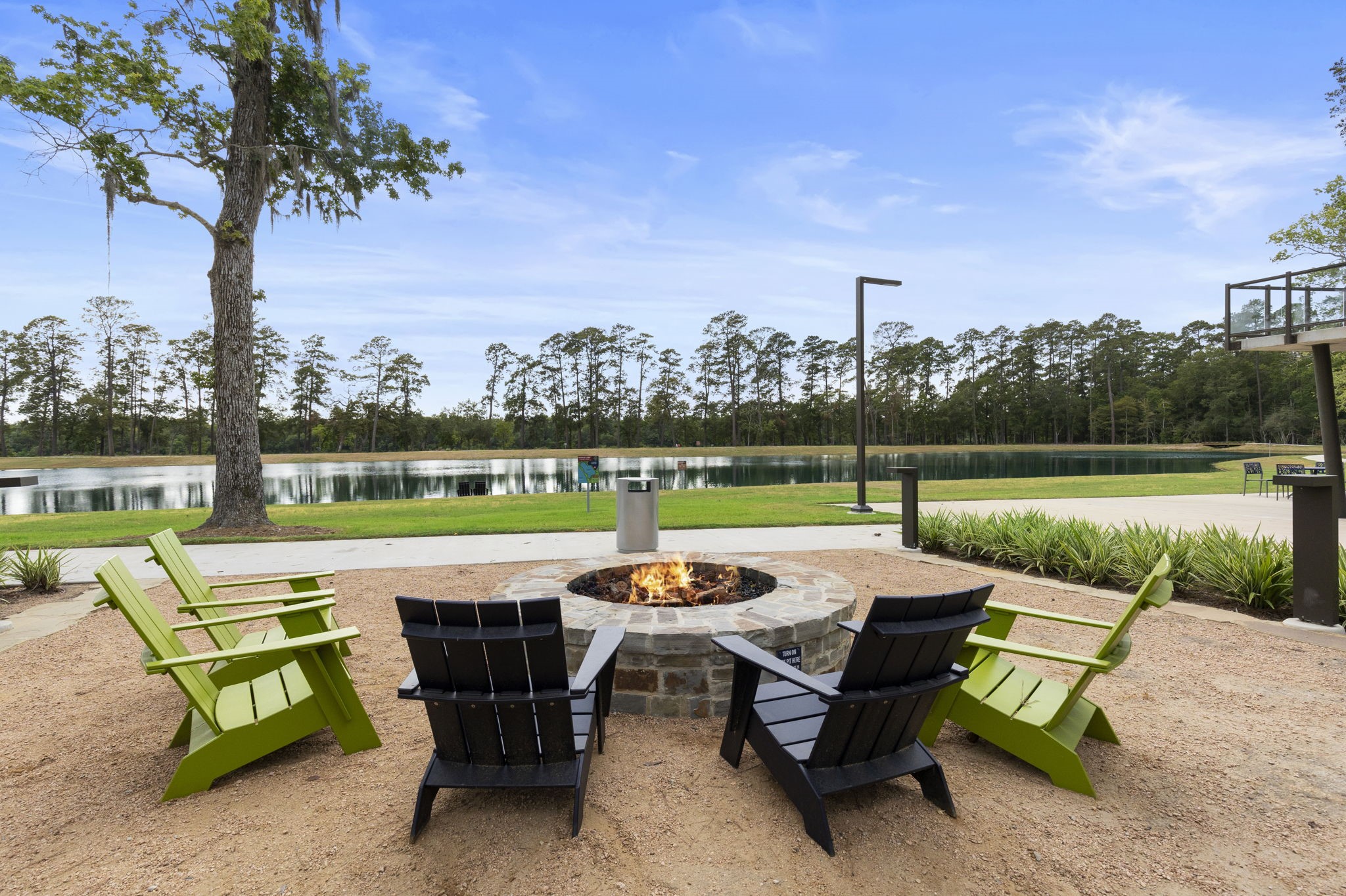545 Cedar Harbor Court Conroe, TX 77304 - Photo 45 of 50 a view of a chairs and table in a yard