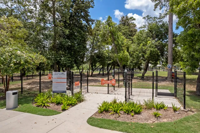 a swimming pool view with a lake view