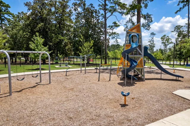 an aerial view of a house with a swimming pool yard and outdoor seating