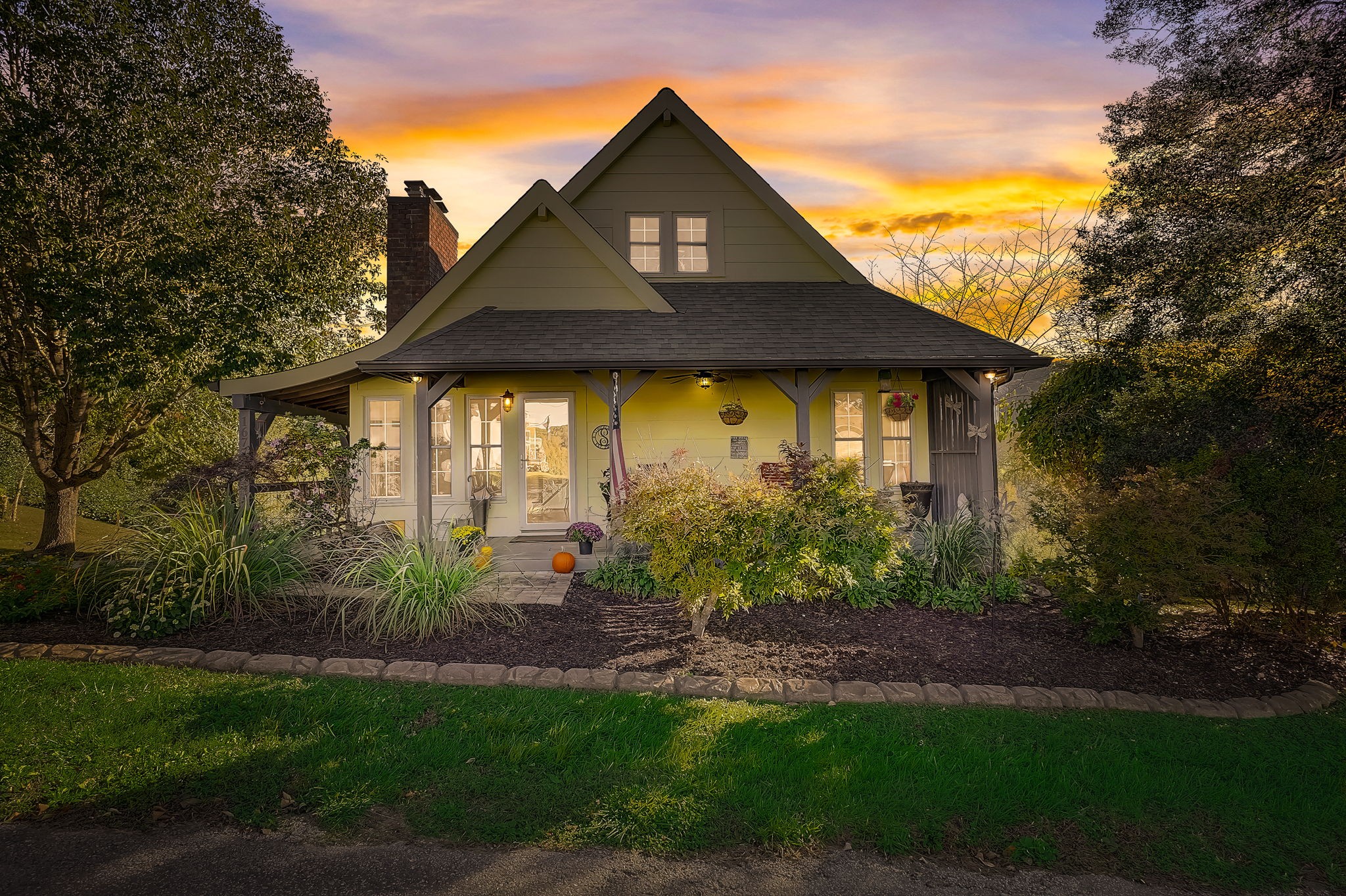 1677 Falling Water Road Sparta, TN 38583 - Photo 3 of 57 a front view of a house with garden