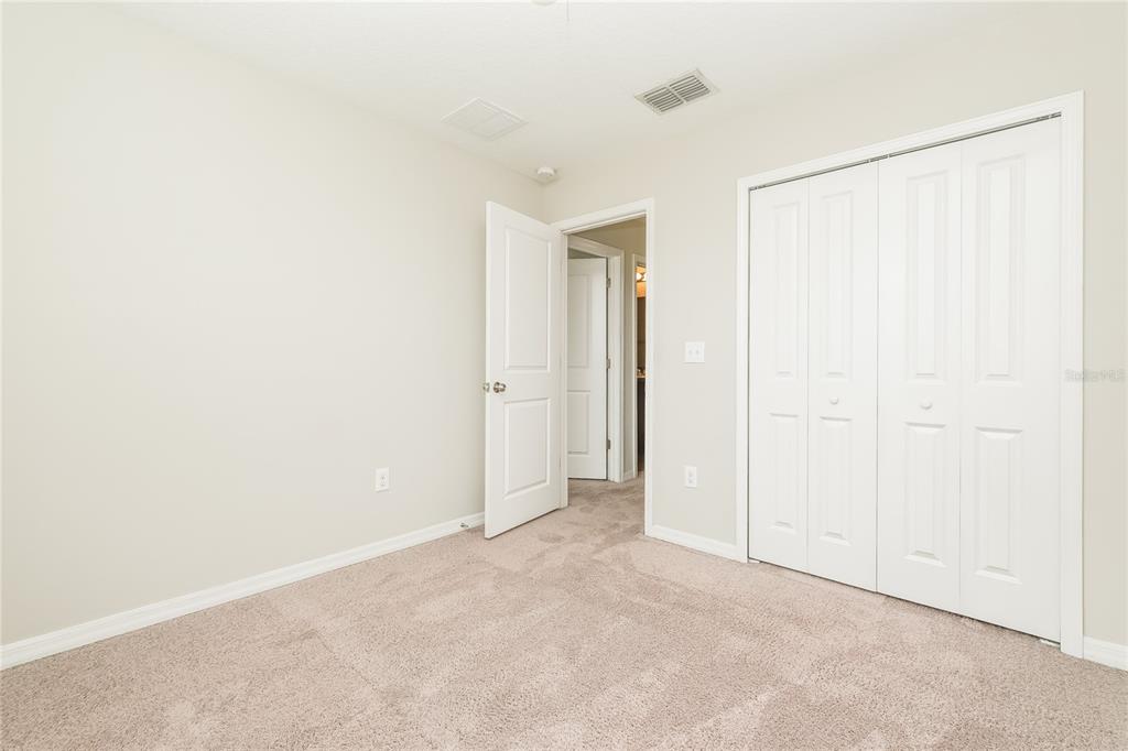 36125 Stable Wilk Avenue Zephyrhills, FL 33541 - Photo 13 of 17 a view of an empty room