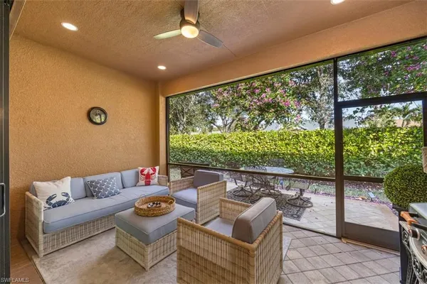 a outdoor living space with furniture and garden view