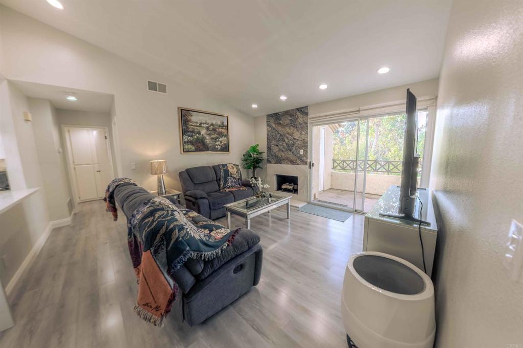 767 Brookstone Road, Unit 301 Chula Vista, CA 91913 - Photo 23 of 28 a living room with furniture and a large window