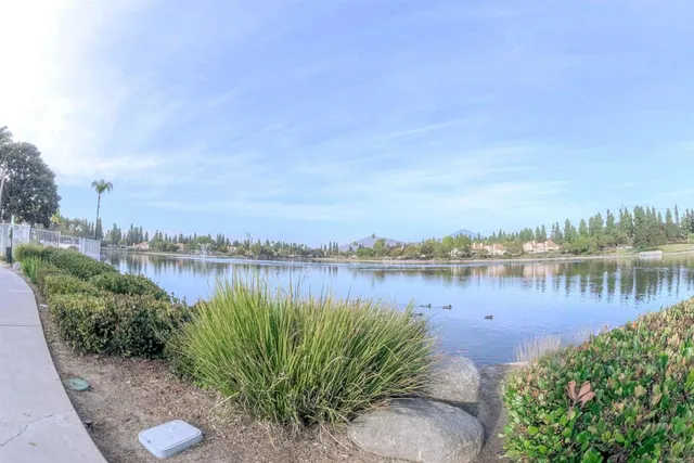 a view of a lake in front of lake and mountain view
