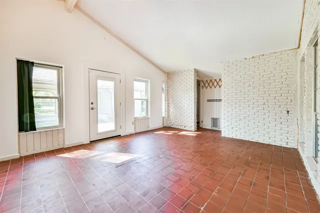 an empty room with windows