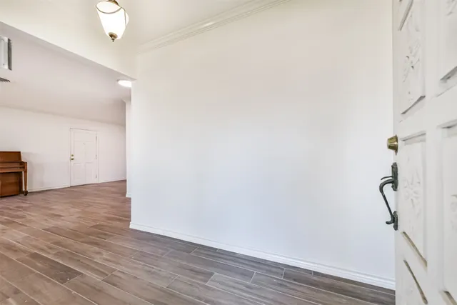 a view of a livingroom with wooden floor