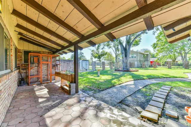 a view of a porch with a backyard