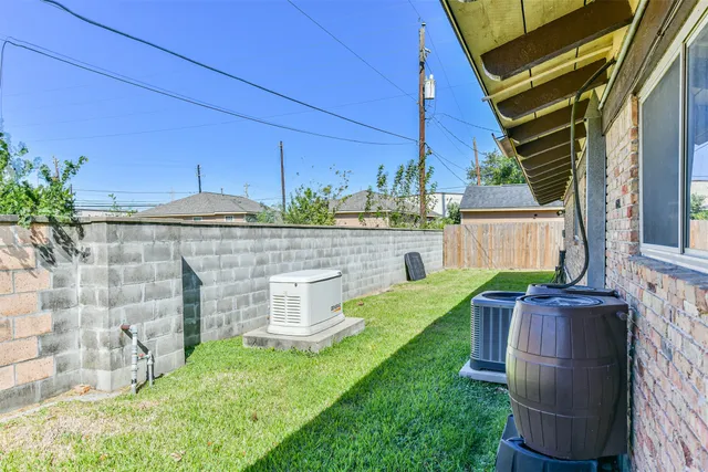 a backyard of a house with seating space