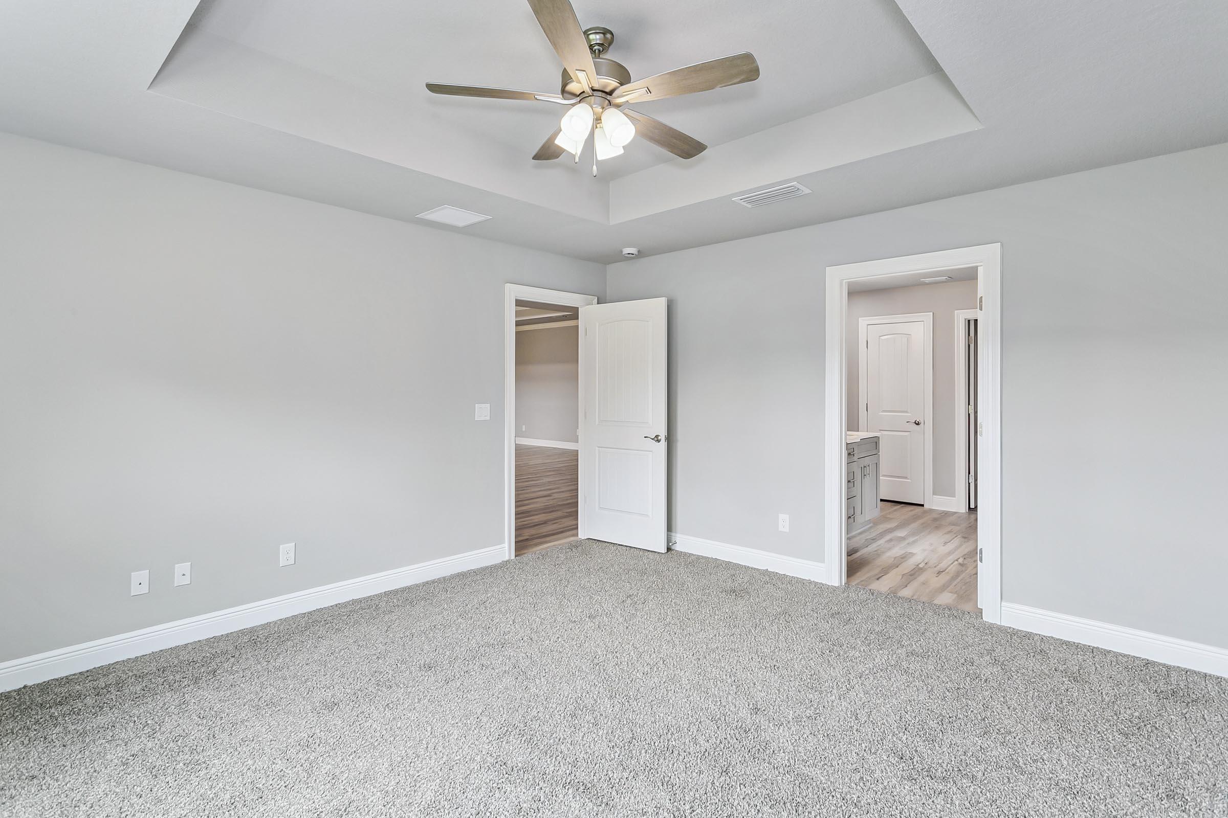 4823 Horace Lunsford Road Milton, FL 32570 - Photo 17 of 34 wooden floor in an empty room