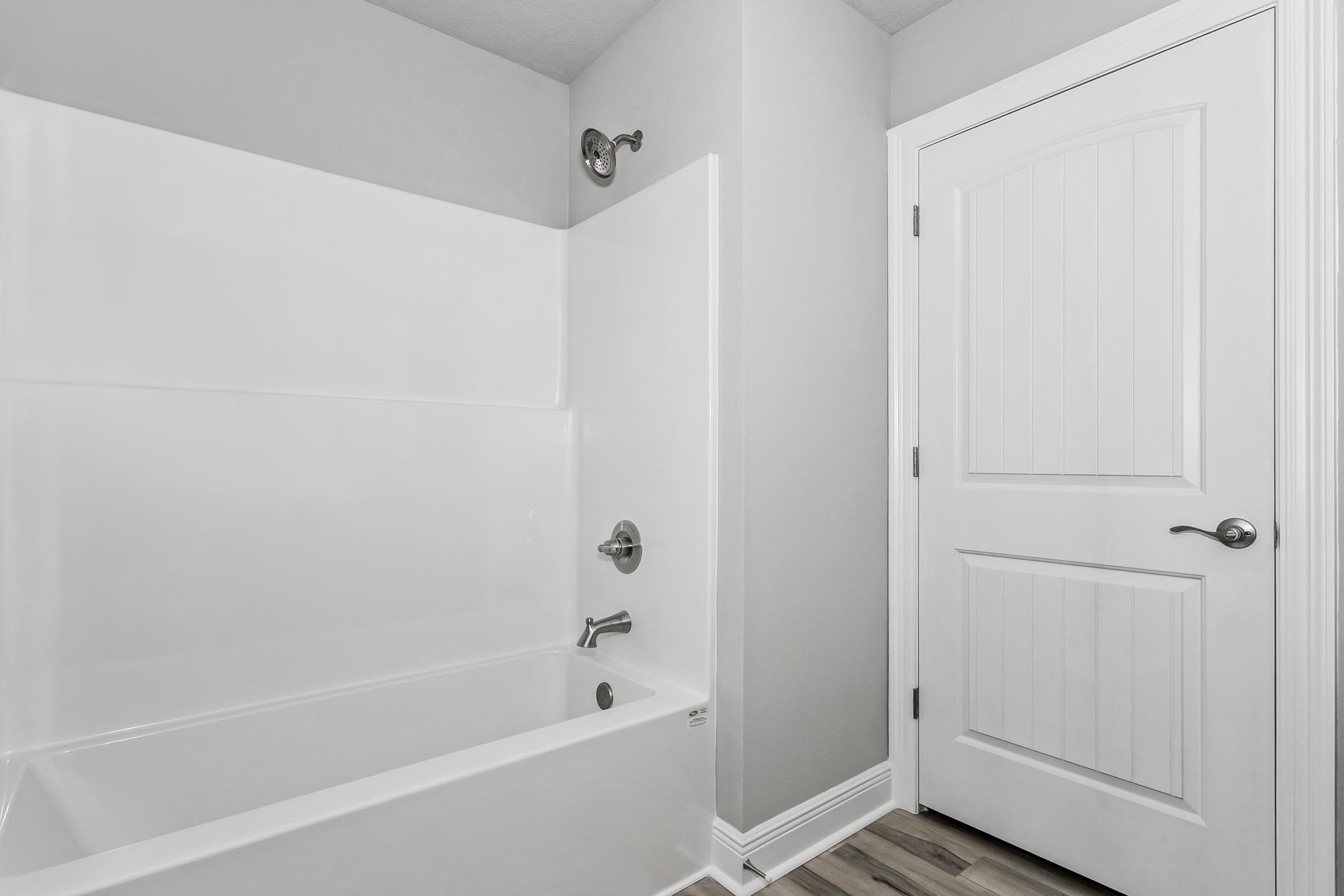 4823 Horace Lunsford Road Milton, FL 32570 - Photo 32 of 34 a bathroom with a bathtub