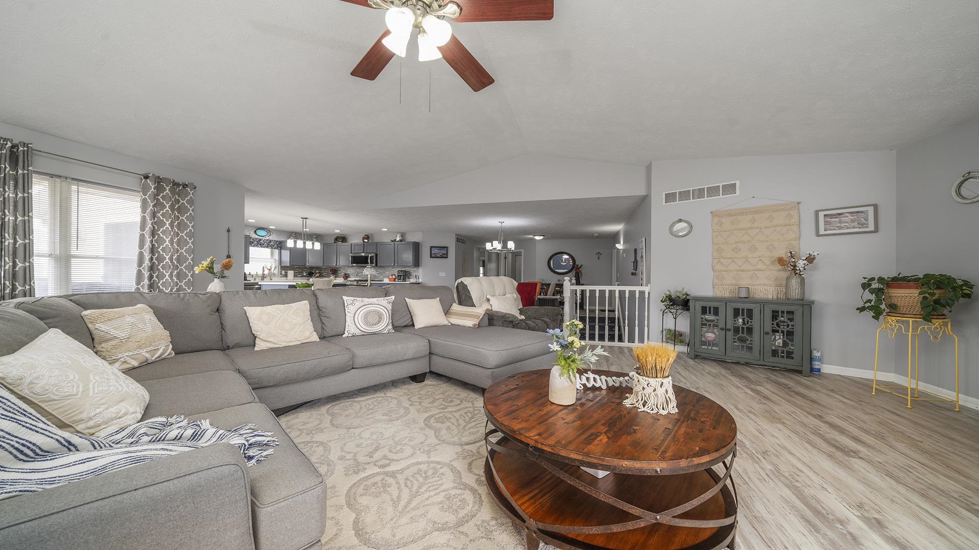 501 Pembroke Road Southwest Poplar Grove, IL 61065 - Photo 13 of 40 a living room with furniture and a wooden floor