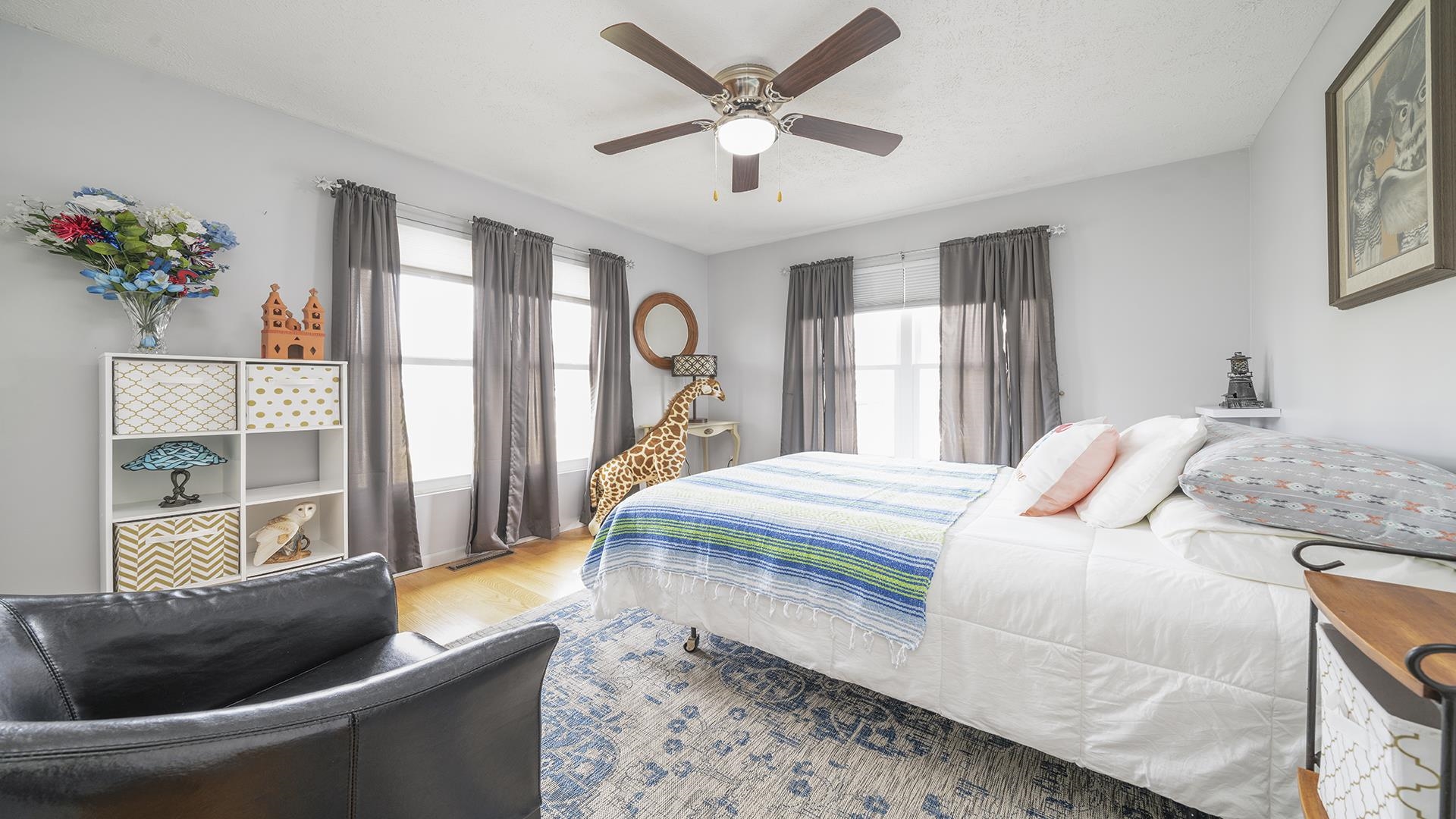 501 Pembroke Road Southwest Poplar Grove, IL 61065 - Photo 17 of 40 a bedroom with a bed and a couch
