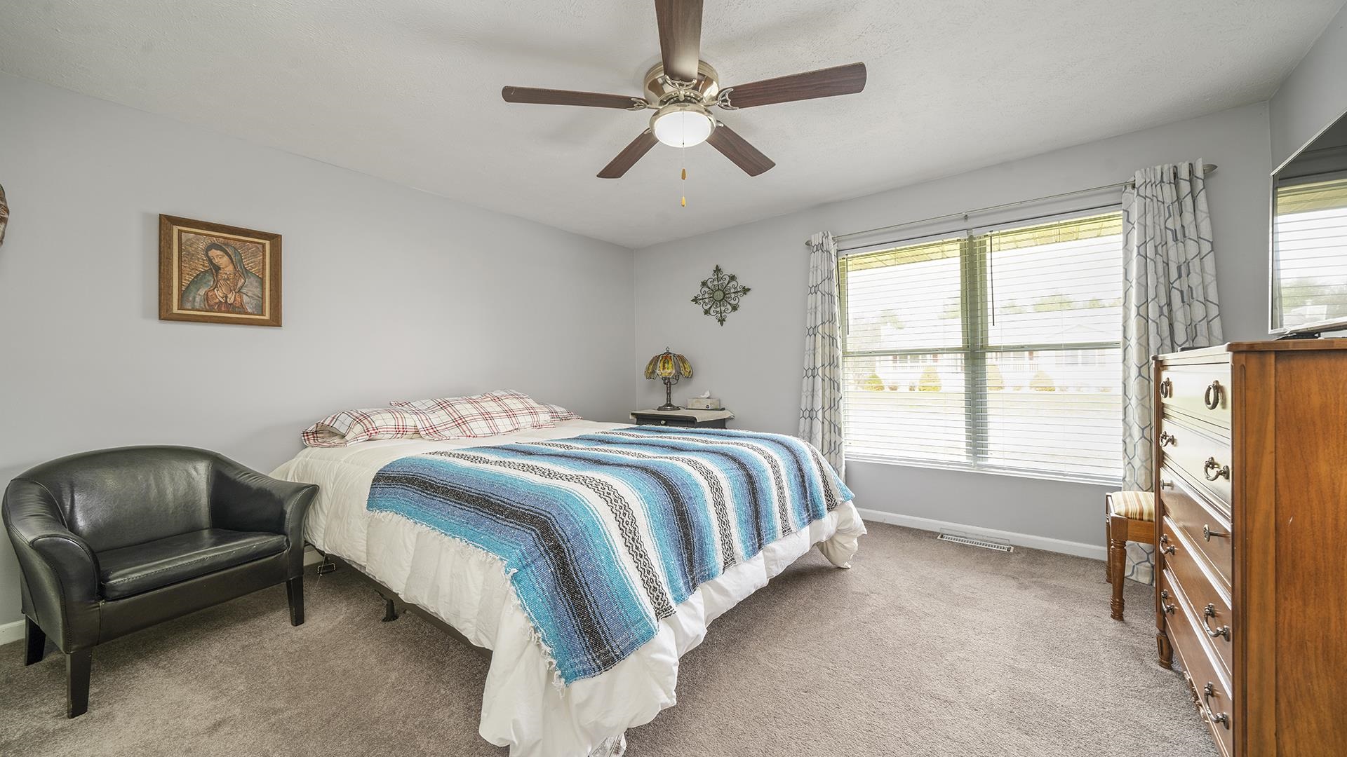 501 Pembroke Road Southwest Poplar Grove, IL 61065 - Photo 20 of 40 a bedroom with a bed and a couch