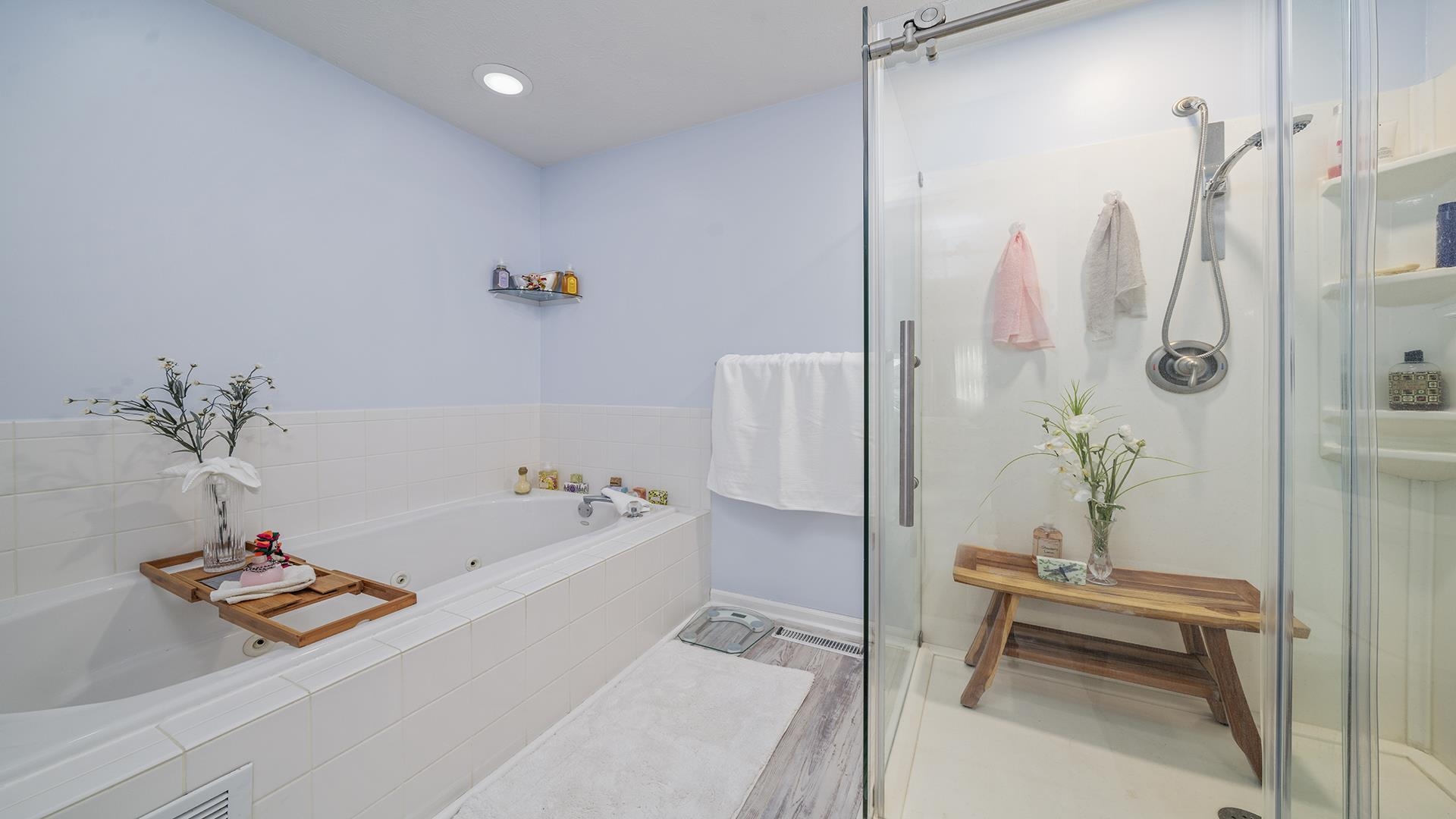 501 Pembroke Road Southwest Poplar Grove, IL 61065 - Photo 24 of 40 a bathroom with a tub and a shower