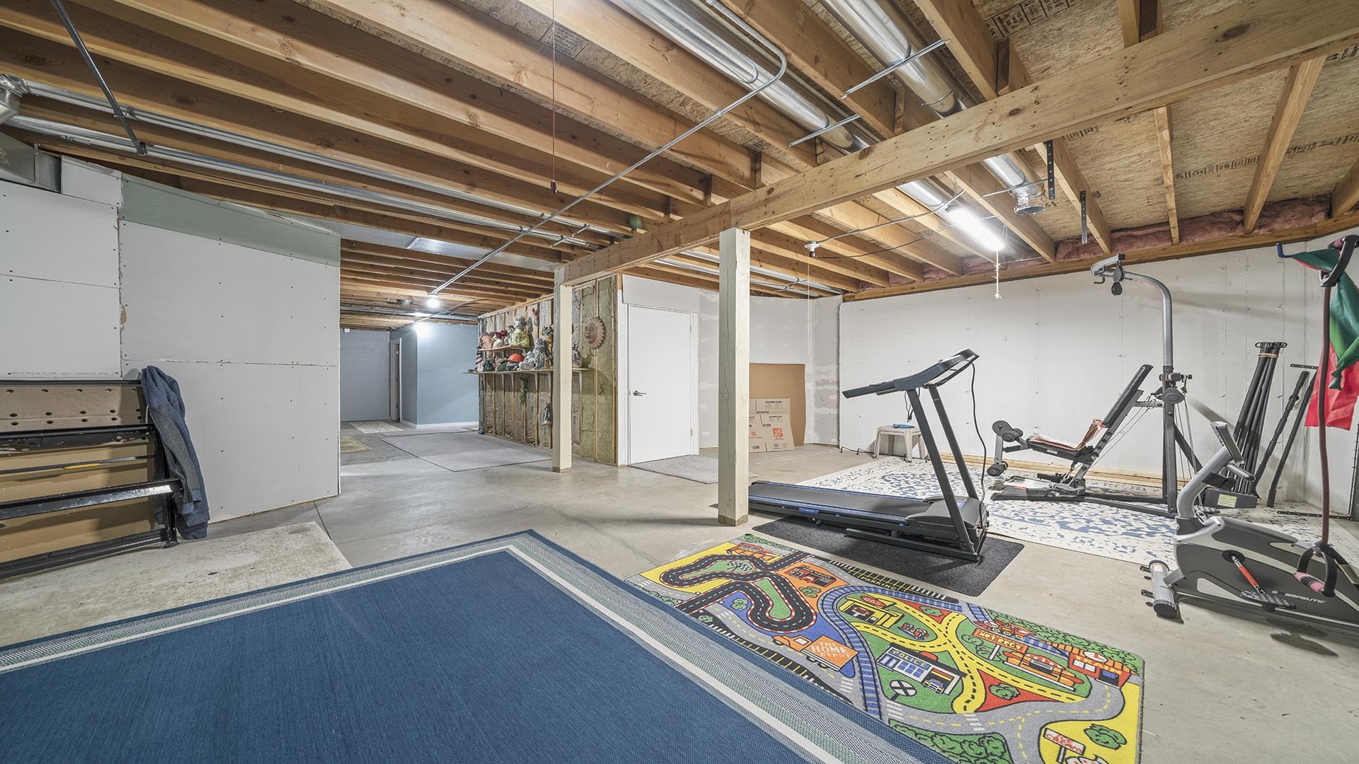 501 Pembroke Road Southwest Poplar Grove, IL 61065 - Photo 33 of 40 a view of a room with gym equipment