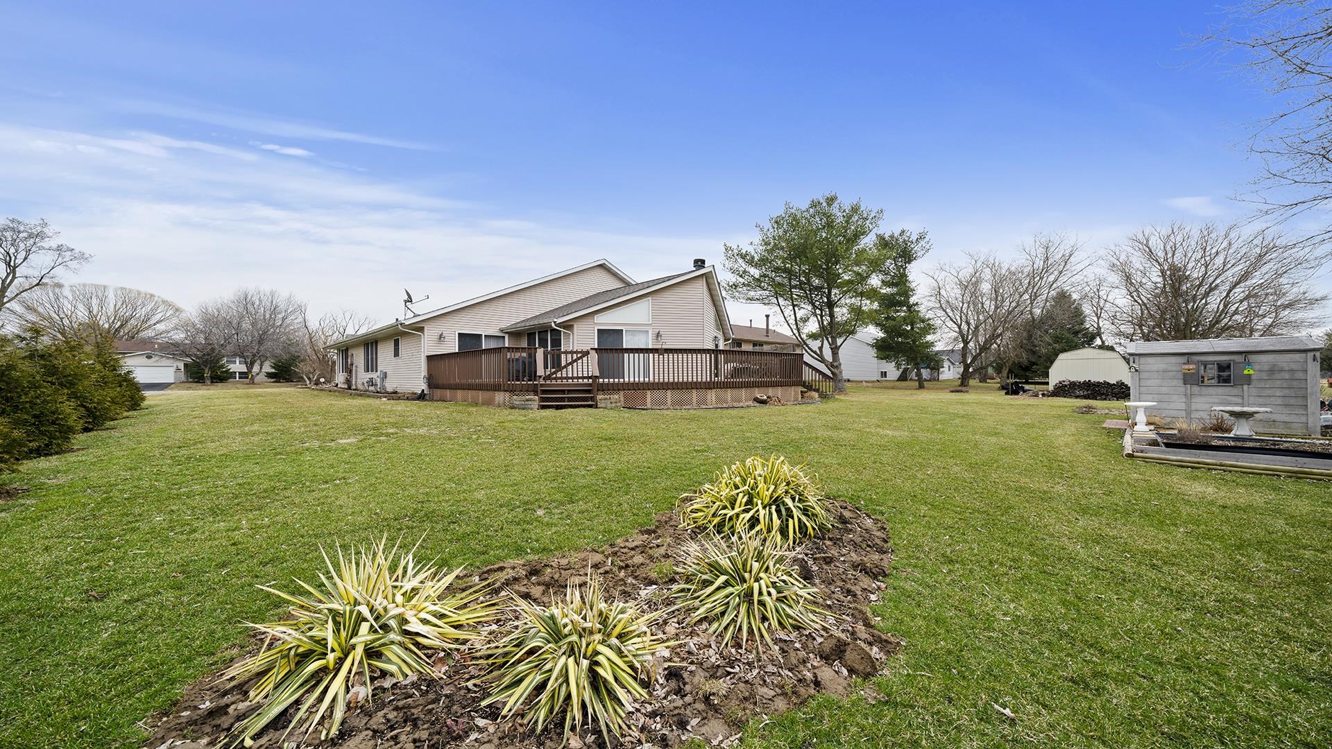 501 Pembroke Road Southwest Poplar Grove, IL 61065 - Photo 38 of 40 a view of a house with a big yard