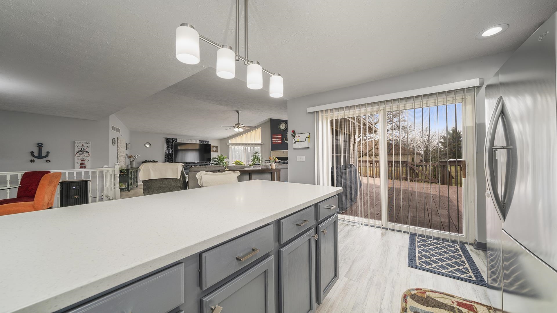 501 Pembroke Road Southwest Poplar Grove, IL 61065 - Photo 7 of 40 a large white kitchen with a large window