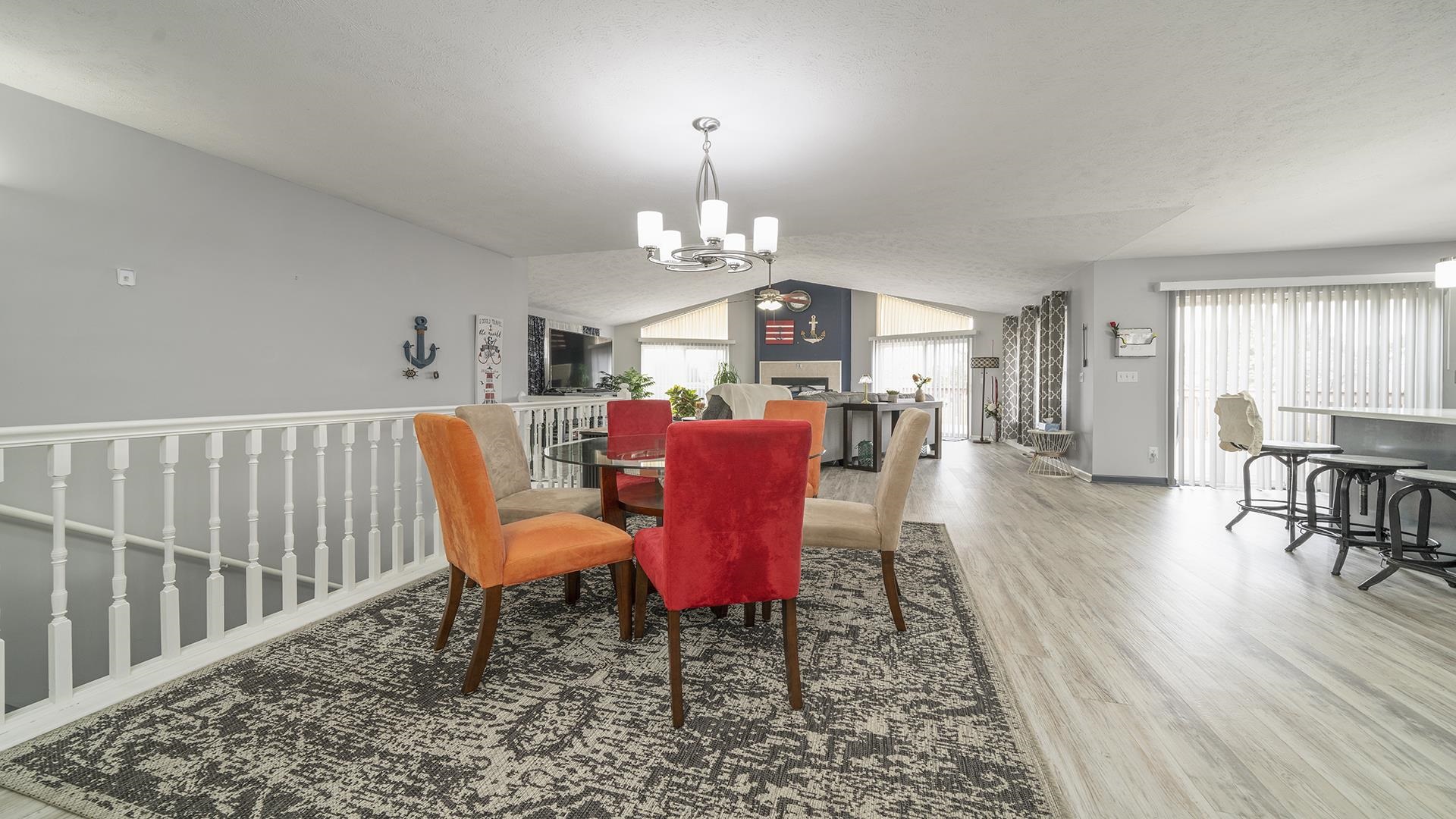 501 Pembroke Road Southwest Poplar Grove, IL 61065 - Photo 9 of 40 a view of a dining room with furniture a chandelier and wooden floor