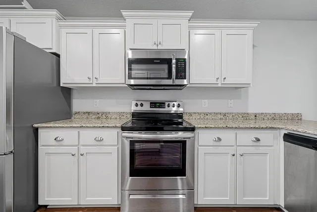 an empty room with wooden floor