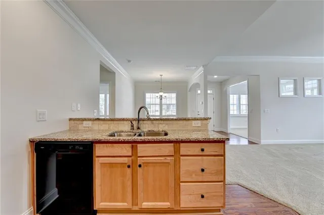 a view of an empty room and closet area