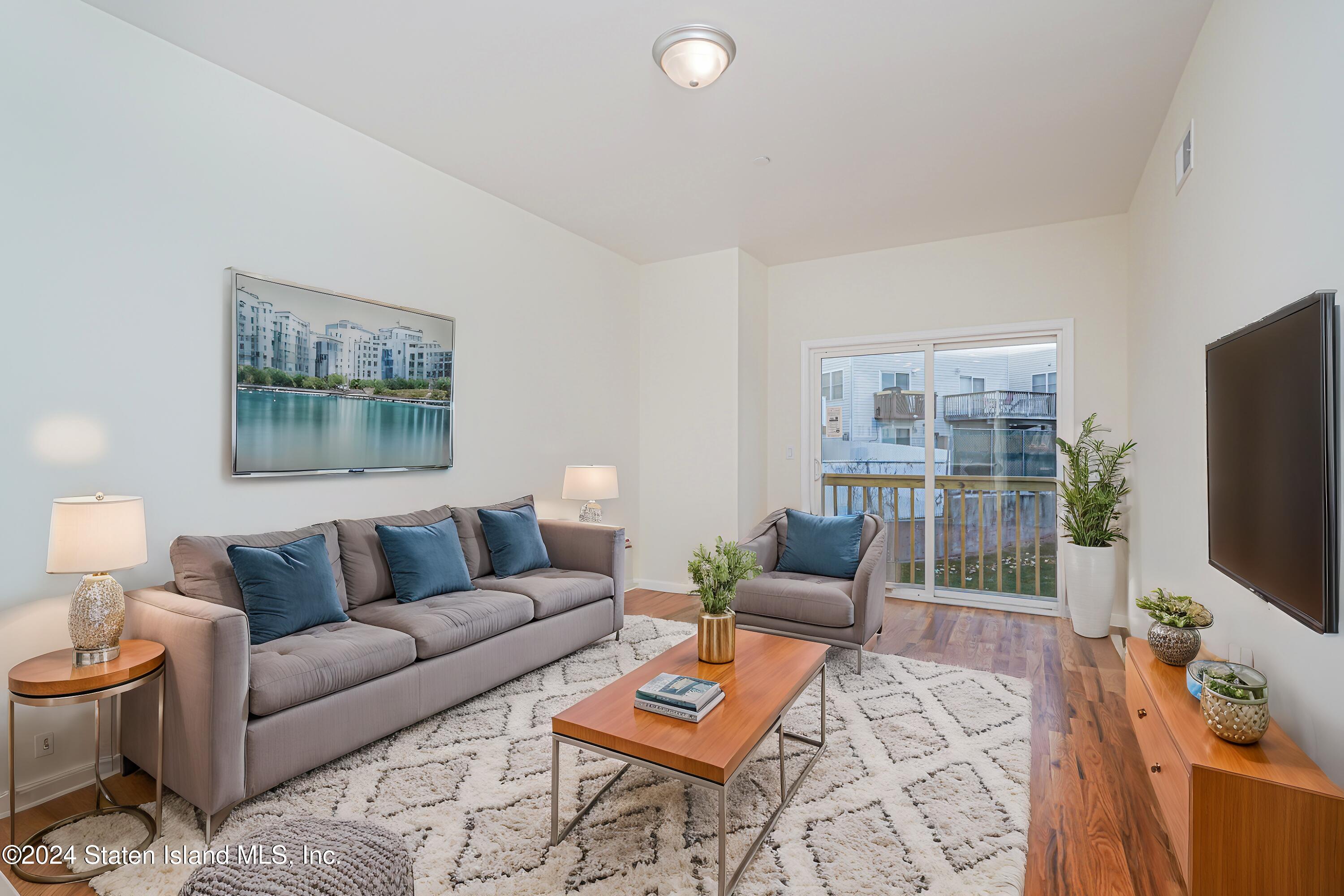 89 Robin Road Staten Island, NY 10305 - Photo 10 of 43 (10) LIVING ROOM STAGED