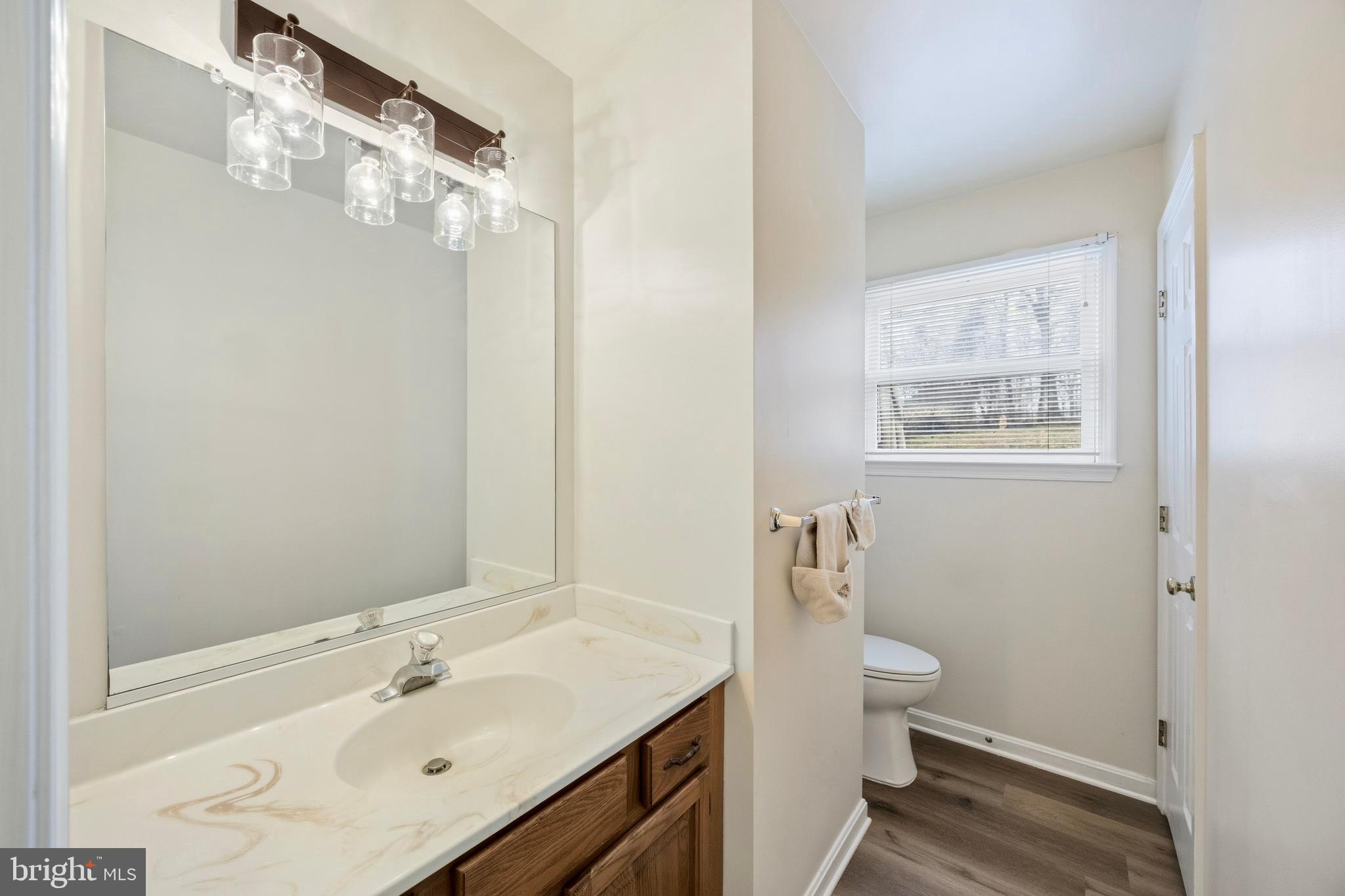 3280 Arundel On The Bay Road Annapolis, MD 21403 - Photo 15 of 40 Main level bathroom down hall from living room
