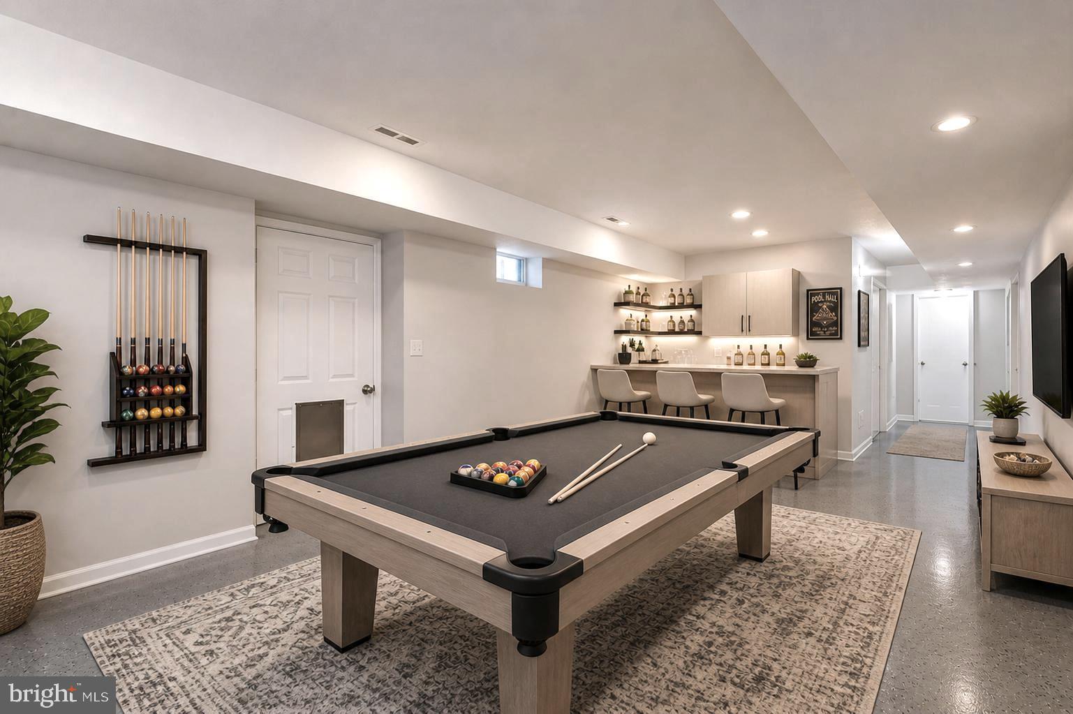 3280 Arundel On The Bay Road Annapolis, MD 21403 - Photo 29 of 40 Virtually staged rec room with space for a bar